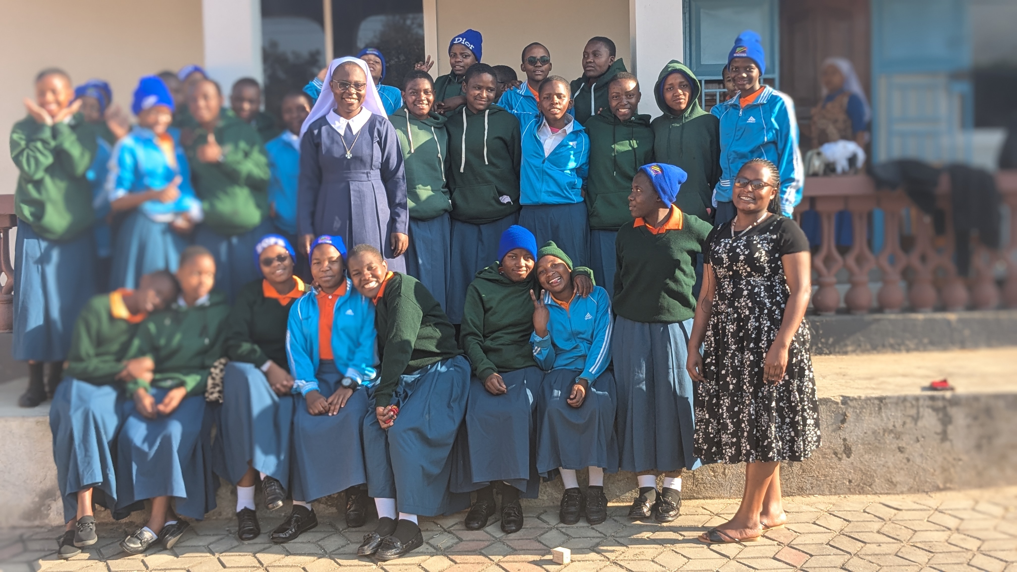 Girls with Sister Mary Nzunda and teachers